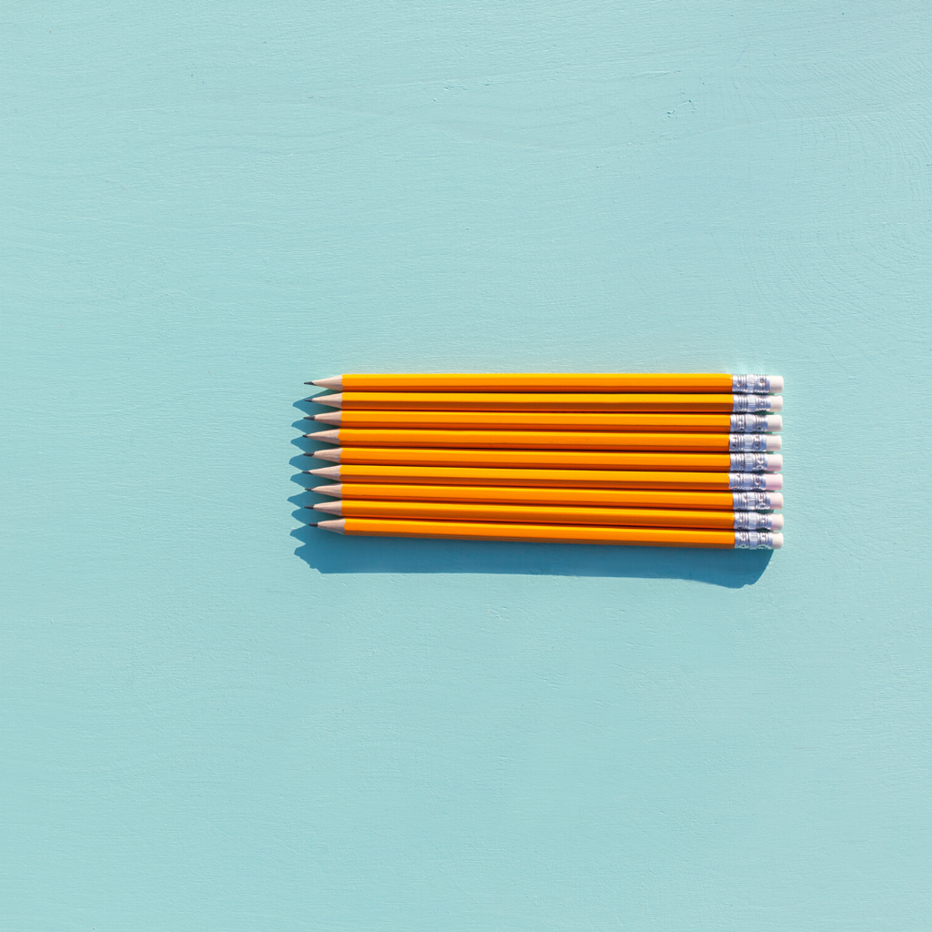 Photo of pencils on a blue background from the Julep Blog. Julep offers flower delivery Johannesburg and flowers in a box.